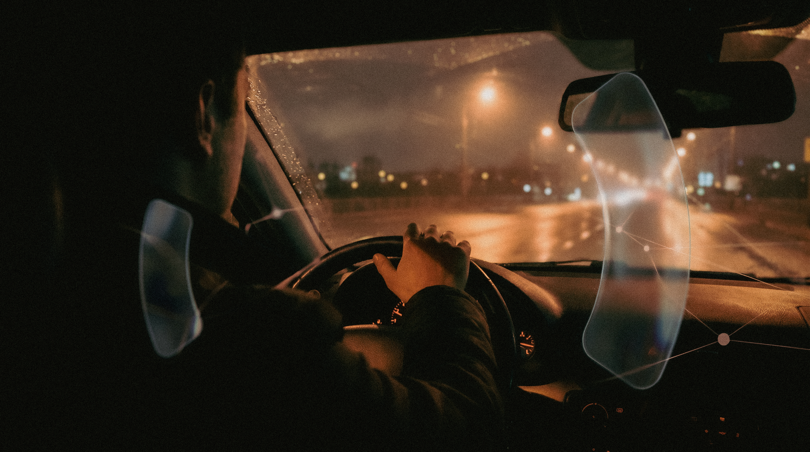 A driver seen from inside a vehicle with liquid glass decision overlays